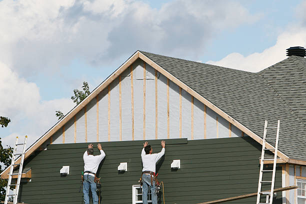 Professional Siding Replacement technician working in Laurel, FL